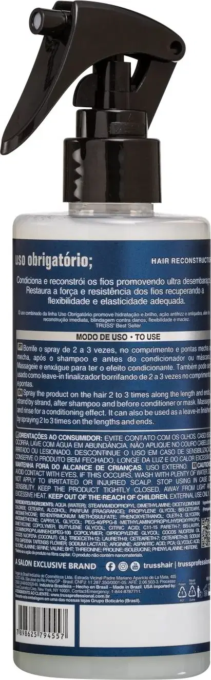 Produto de reconstrução capilar TRUSS Professional. Frasco plástico transparente com spray acionado por gatilho preto. Rótulo azul e preto com texto descrevendo o produto como "Hair Reconstructor" (Reconstrutor Capilar).