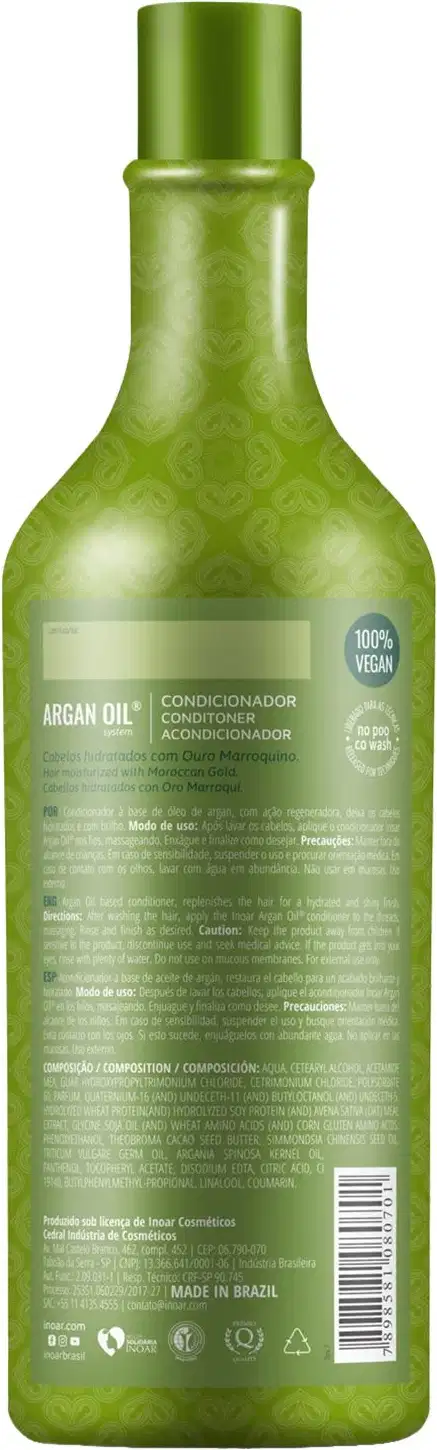 Produto de beleza capilar da marca Inoar. Frasco plástico verde transparente com formato de garrafa. Rótulo branco com texto "Argan Oil Condicionador" e descrição do produto em português.