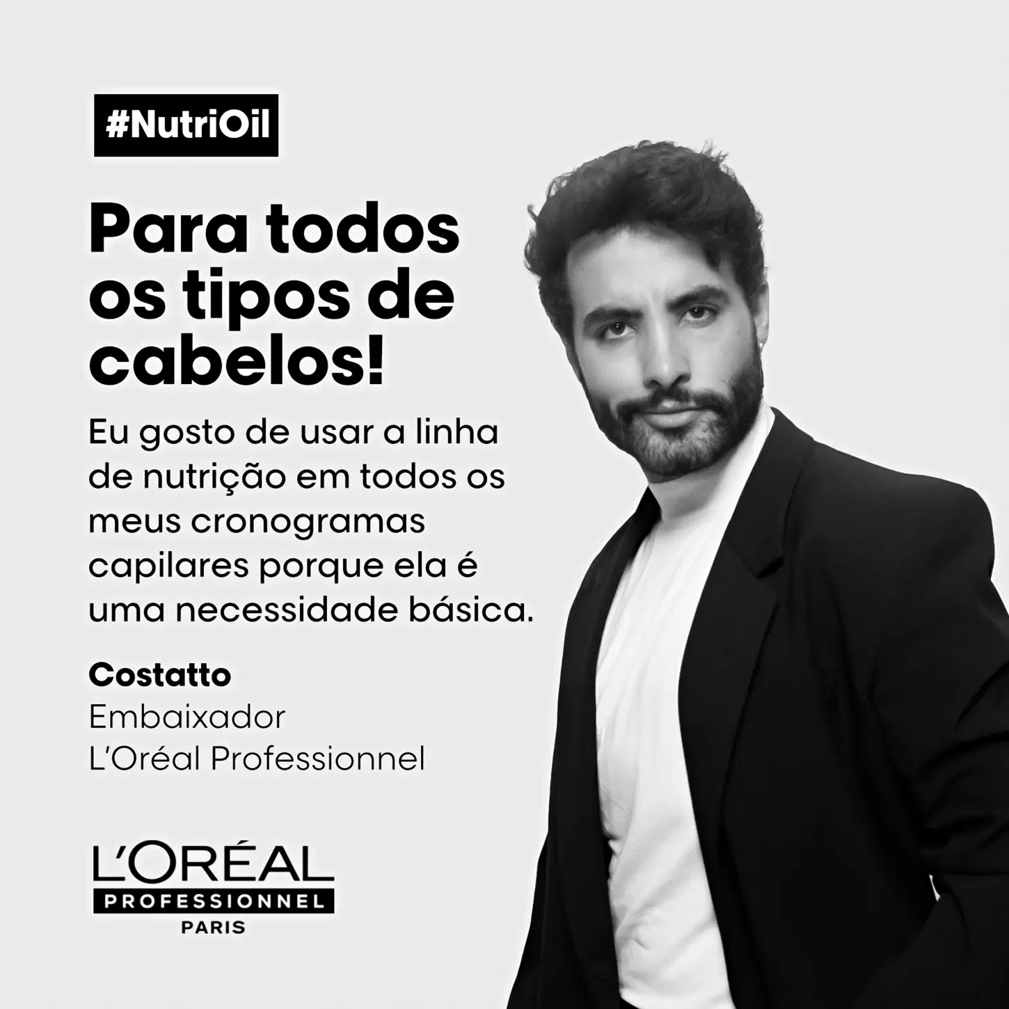 A imagem apresenta uma propaganda para a linha de produtos NutriOil da L'Oréal Professionnel. Um homem de meia-idade, com barba e cabelos escuros, vestindo um terno preto e camisa branca, aparece na foto.