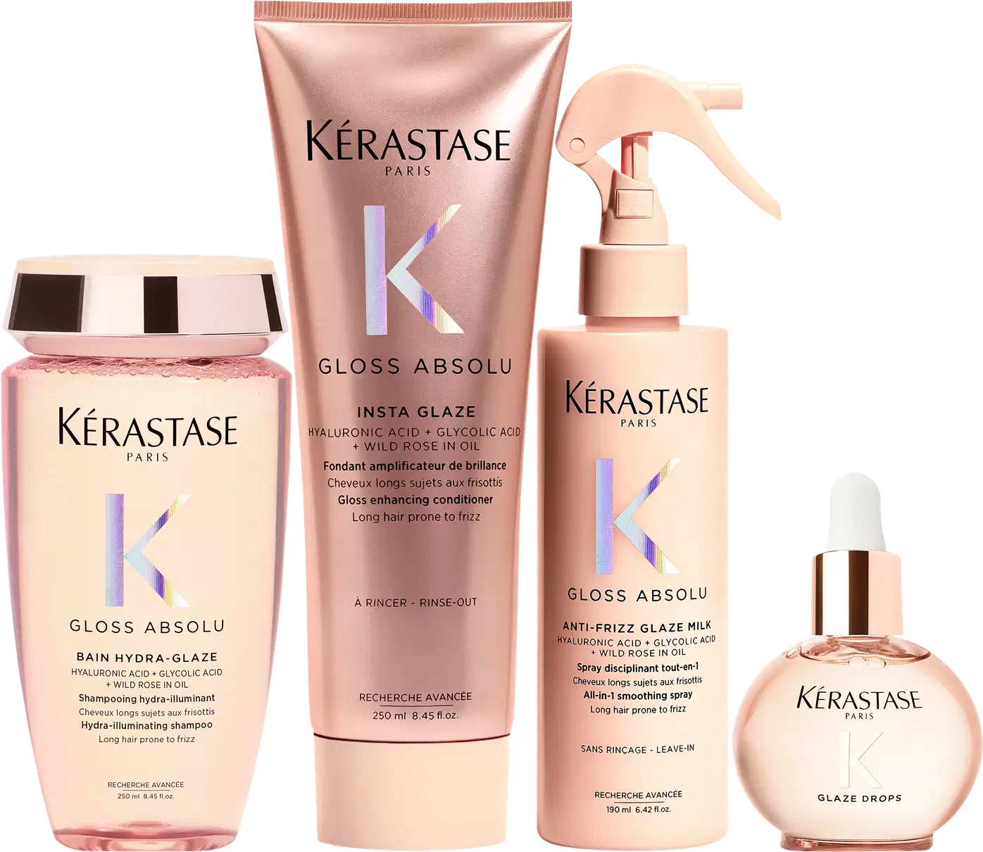 Produtos Kérastase em embalagens rosa e bege, incluindo shampoo, condicionador, spray e sérum para cabelos. As embalagens apresentam o logotipo da marca e informações sobre os benefícios dos produtos, como redução do frizz e brilho.