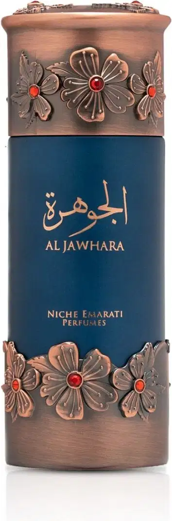 Frasco de perfume da marca Lattafa Perfumes, com design em tom azul escuro e detalhes em metal dourado com flores decorativas. O rótulo exibe o nome "Al Jawhara" em árabe.
