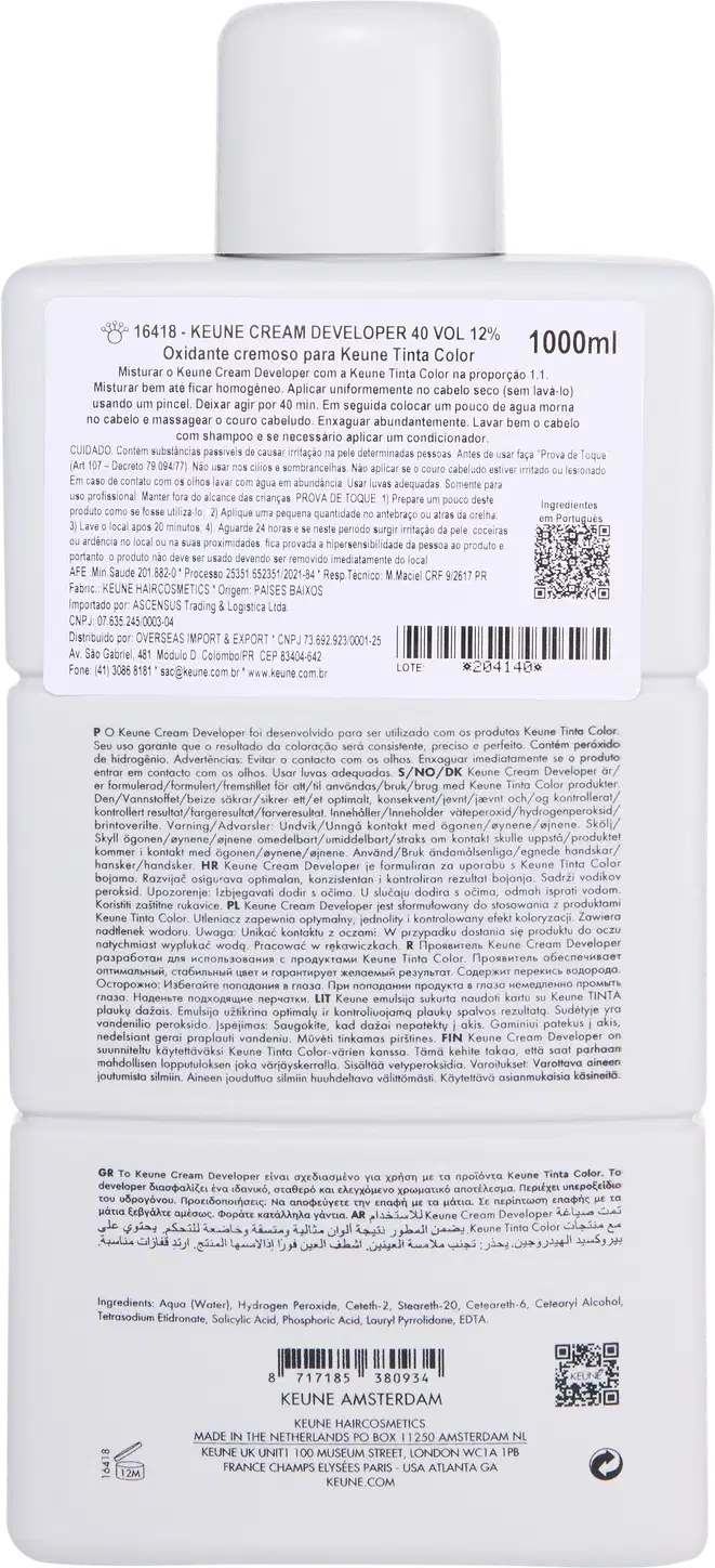 Frasco branco da marca Keune, contendo Cream Developer com 12% - 40 VOL. O rótulo apresenta o nome da marca e do produto em letras pretas.
