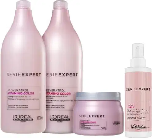 A imagem mostra shampoo e condicionador, 2 frascos rosa, máscara capilar pote rosa arredondado e spray 2 em 1 rosa.