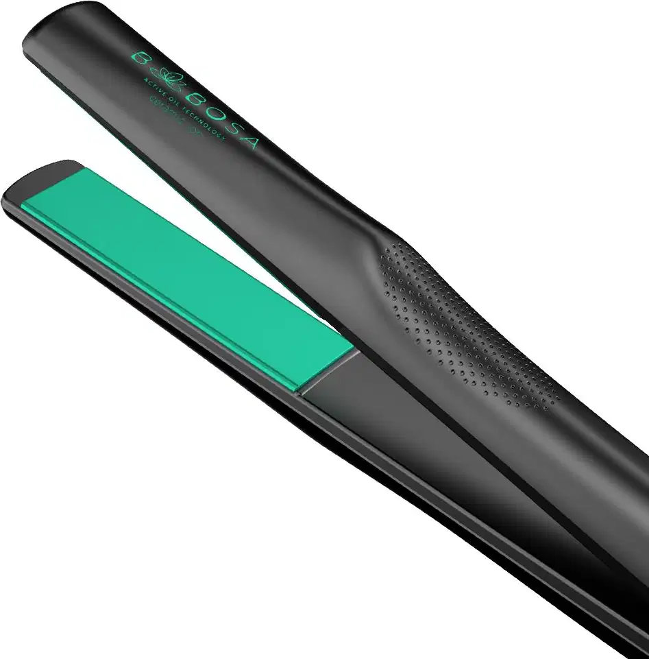A imagem mostra uma chapinha com design alongado e cilíndrico, com um corpo preto fosco e detalhes em verde esmeralda. O modelador apresenta um formato ergonômico e linhas modernas.