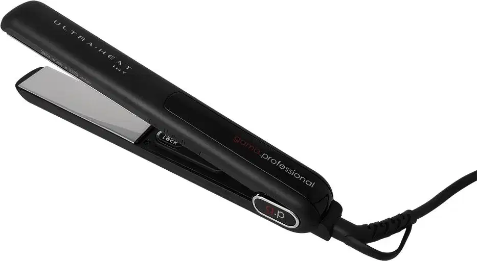 A imagem mostra uma chapinha alisadora elétrica preta, com uma placa aquecedora e display digital. Possui o nome da linha "Ultra Heat" gravado no corpo. O produto é longo, fino e possui um cabo com fio elétrico para conexão.