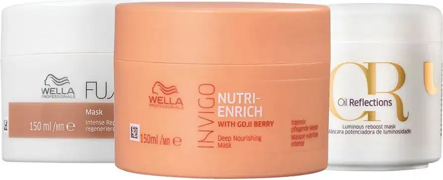 No centro, há uma máscara nutritiva Nutri-Enrich Deep Nourishing Mask with Goji Berry" de 150ml. À esquerda, um pote de 150ml da linha Fusion com uma máscara capilar À direita, uma máscara da linha Oil Reflections com 150ml.