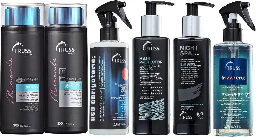 Conjunto de produtos de cuidados capilares da marca Truss, incluindo shampoos, condicionadores, protetores térmicos, soro para cabelos e máscara líquida, em embalagens pretas e azuis com rótulos e informações sobre os produtos.
