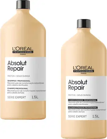 São dois frascos grandes de 1,5 litros da linha Absolut Repair da L'Oréal Professionnel. Os frascos têm uma cor bege claro e tampas pretas. Um frasco é rotulado como "Shampoo Profissional", enquanto o outro é rotulado como "Condicionador Profissional".