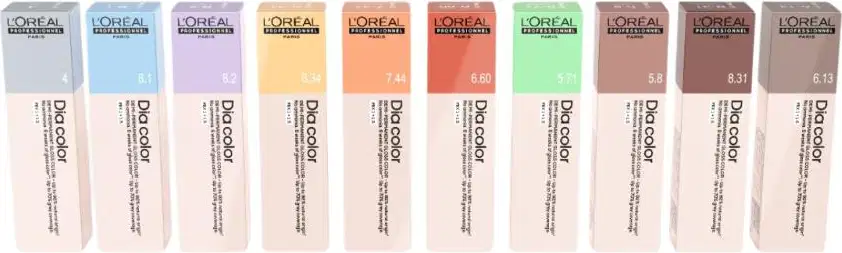 A imagem mostra uma linha de produtos de coloração de cabelo da marca L'Oréal Professionnel. São apresentados dez tubos plásticos retangulares, cada um com uma cor diferente na parte superior, variando do cinza claro ao castanho escuro.