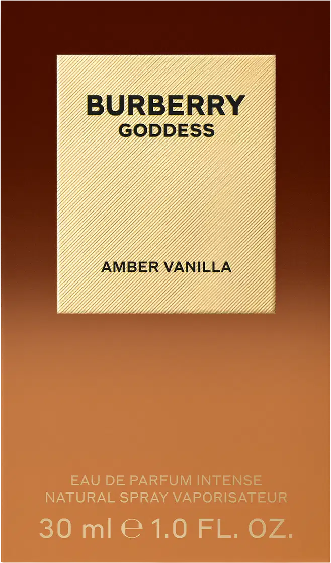 Perfume Burberry Goddess Amber Vanilla em frasco quadrado âmbar com tampa dourada. Rótulo circular dourado com inscrição "Burberry Goddess" e texto "Amber Vanilla" na base. Design luxuoso e elegante.