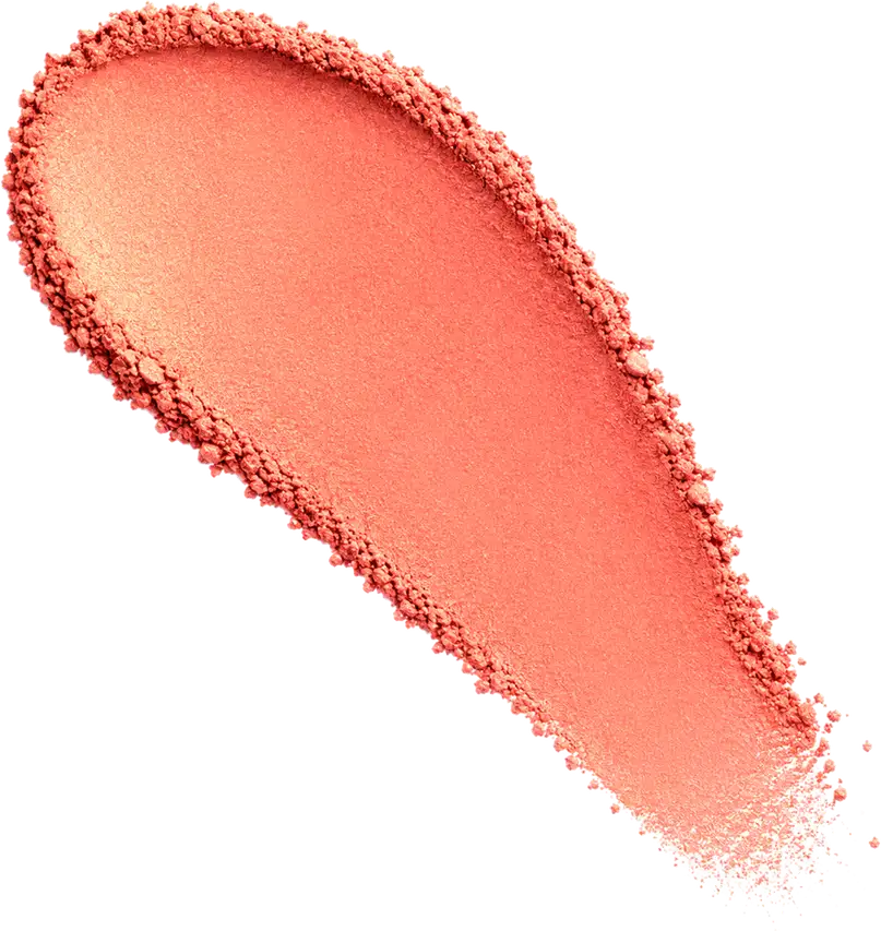 Amostra de blush em pó em tom coral, aplicado em superfície branca.