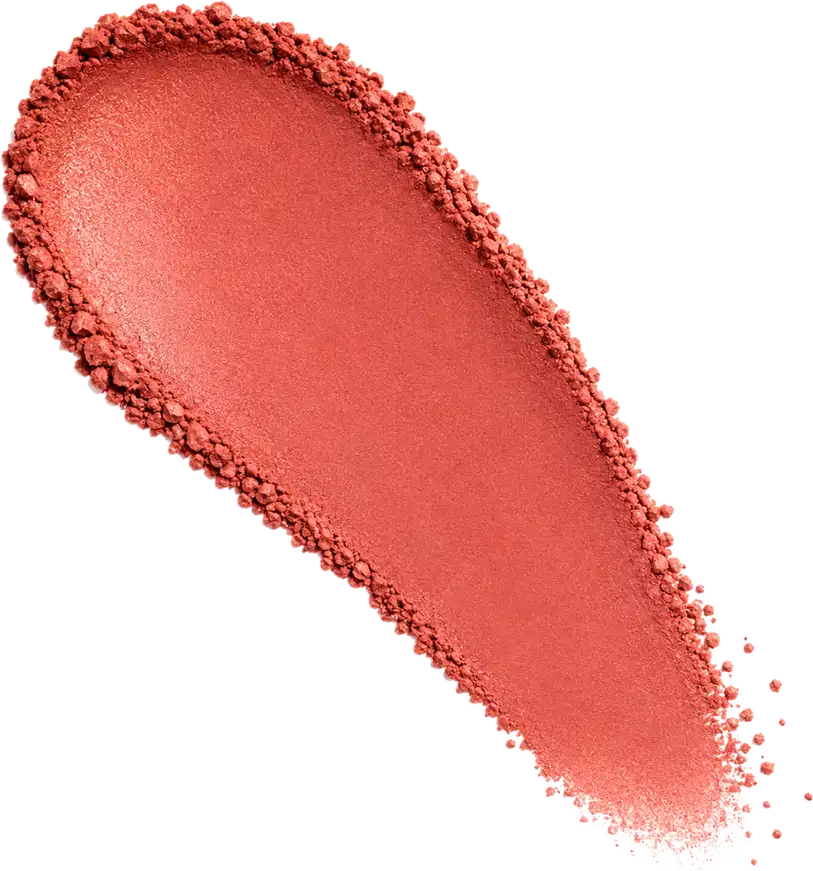 Amostra de blush em pó em tom laranja-avermelhado, aplicado em superfície branca.