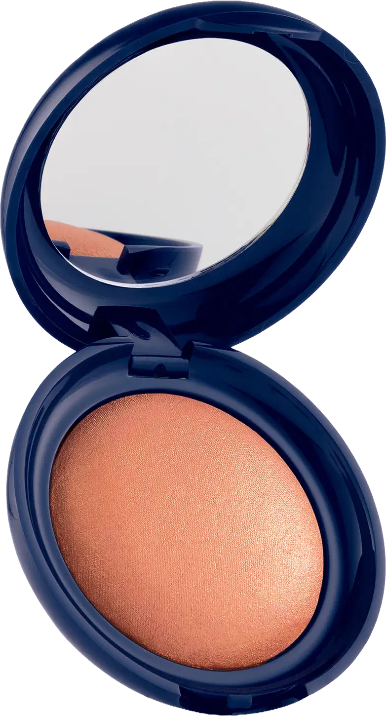 Blush em pó com embalagem redonda azul-marinho, espelho integrado na tampa e produto em tom alaranjado com acabamento luminoso.