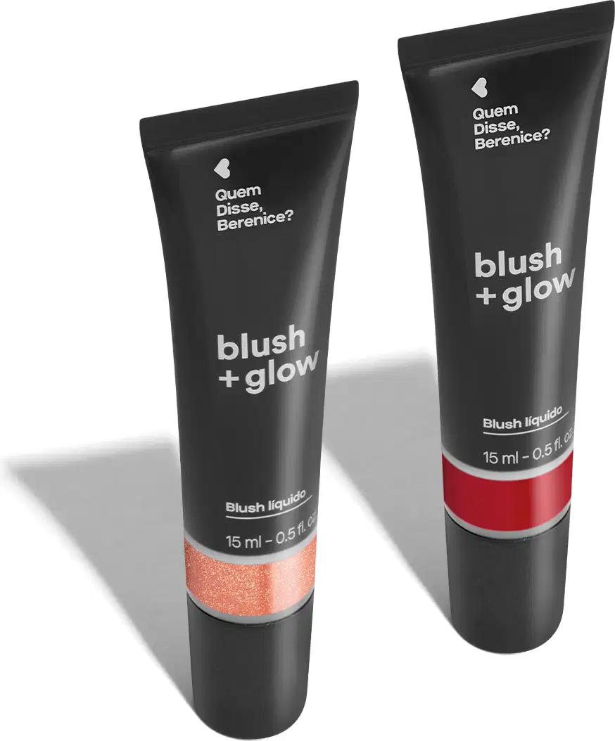 Imagem de duas bisnagas de blush líquido Blush +Glow, sendo o Rosedourex na cor rosa e o Lichiali na cor vermelha. As embalagens são pretas com parte transparente, mostrando a cor do produto, e letras brancas. O fundo da imagem é branco com sombreado.