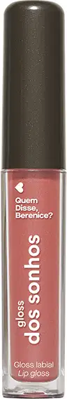 Gloss labial Dos Sonhos contendo o texto "Quem disse, Berenice?". O produto apresenta uma textura brilhante e uma cor rosada suave.