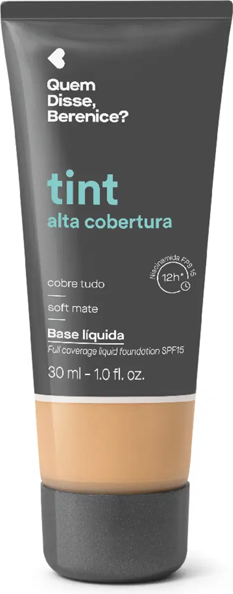 Bisnaga cinza escura com faixa bege de base líquida da marca Quem Disse, Berenice? com acabamento soft mate, com texto em destaque na cor azul indicando "tint alta cobertura".