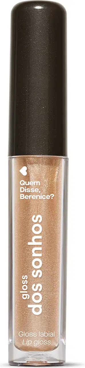 Gloss labial dourado Douradex Dos Sonhos Quem Disse, Berenice?  em embalagem transparente, mostrando a tonalidade do produto, tampa preta e rótulo com letras brancas.