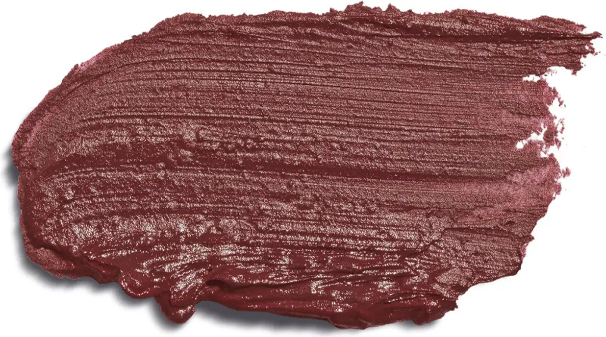Trata-se de uma textura cremosa e de cor marrom nude. A embalagem não é visível, mas o produto em si é mostrado em destaque contra um fundo branco, permitindo uma visualização clara de sua tonalidade e acabamento.