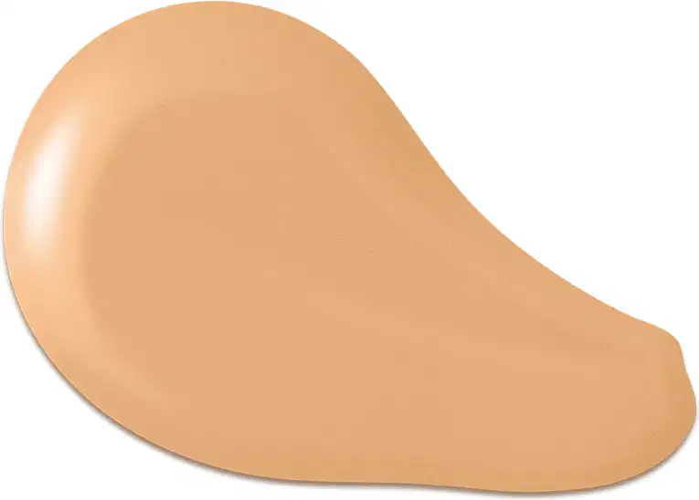 O produto apresentado na imagem é uma base de maquiagem de cor bege, com uma textura cremosa e suave. Sua forma é arredondada e convexa. Não há rótulos, marcas ou outras informações visíveis na imagem.
