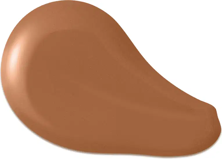 O produto apresentado na imagem é uma base de maquiagem de cor marrom escuro, com uma textura cremosa e suave. Sua forma é arredondada e convexa. Não há rótulos, marcas ou outras informações visíveis na imagem.