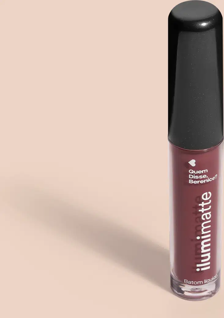 Frasco de 4ml contendo batom líquido rosa Roselumi Ilumimatte da marca Quem Disse, Berenice? em embalagem transparente mostrando o produto na cor rosa, tampa preta e letras brancas em fundo rosado com leve sombreado.