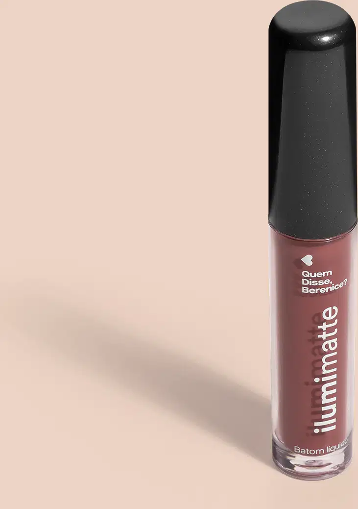 Frasco de 4ml contendo batom líquido nude Begelumi Ilumimatte da marca Quem Disse, Berenice? em embalagem transparente mostrando o produto na cor bege, tampa preta e letras brancas em fundo rosado com leve sombreado.