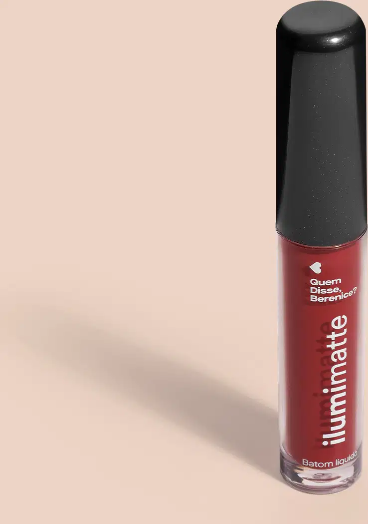Frasco de 4ml contendo batom líquido vermelho Vermelumi Ilumimatte da marca Quem Disse, Berenice? em embalagem transparente mostrando o produto na cor marrom, tampa preta e letras brancas em fundo rosado com leve sombreado.