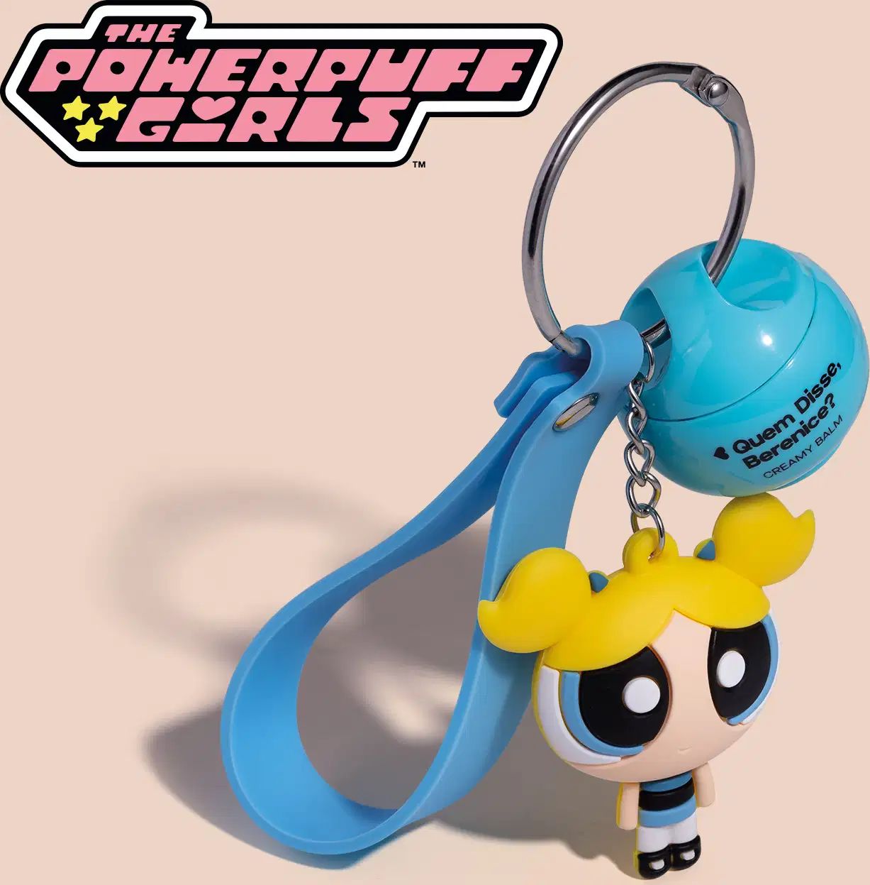 Chaveiro em formato de personagem das Meninas Superpoderosas, Lindinha. Embalagem com logotipo da marca "The Powerpuff Girls" e Quem Disse, Berenice?".