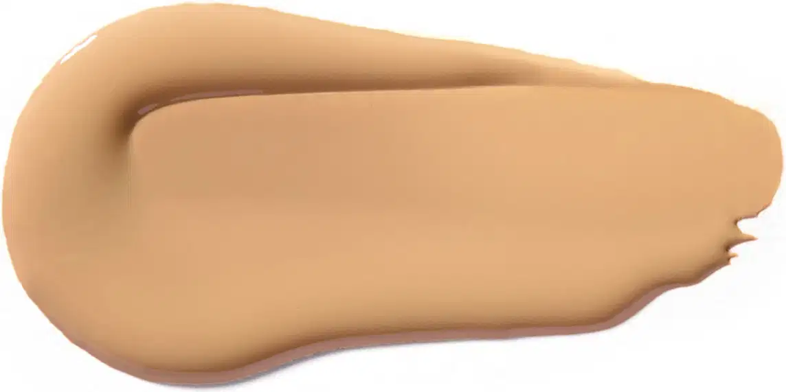 Textura cremosa e suave, com tonalidade bege clara, apresentando aspecto homogêneo e uniforme, típica de um produto de base ou corretivo da marca Vult.