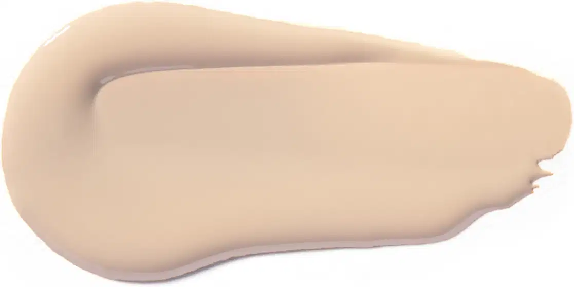 Textura cremosa, de aparência suave e uniforme, com tonalidade bege clara. Apresenta consistência densa e sedosa, típica de produtos de base para maquiagem da marca Vult.