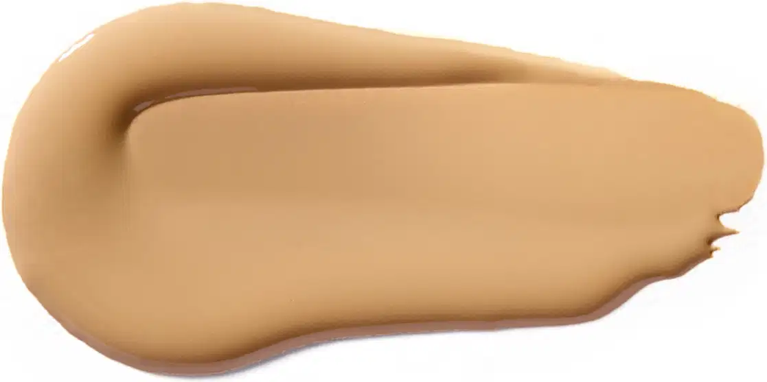 Textura cremosa, de cor bege clara, com aparência suave e uniforme, típica de um produto de base ou corretivo da marca Vult.