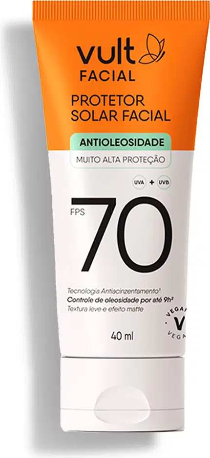 Protetor solar facial em embalagem plástica tubular de cor laranja e branca.
