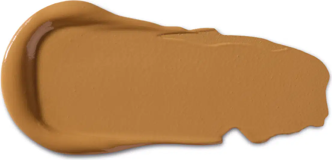 Textura cremosa de tom marrom, com acabamento matte e superfície lisa.
