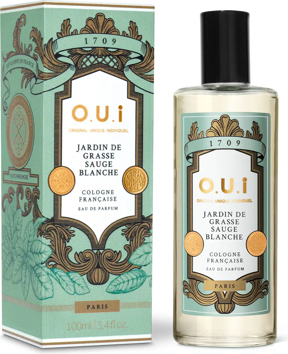 Frasco de perfume O.U.i. Jardin de Grasse Sauge Blanche ao lado da caixa, ambos com embalagem em tons de verde e dourado, exibindo ilustrações decorativas e informações sobre a fragrância.