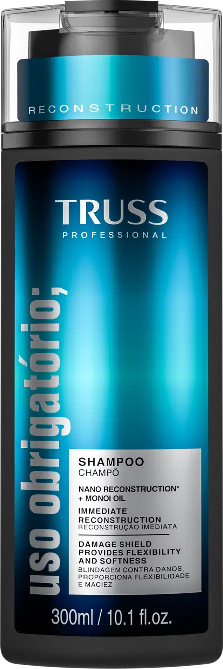 Frasco de shampoo da marca TRUSS Professional, com embalagem em tons de azul e preto, apresentando o nome da linha "Uso Obrigatório" e informações sobre a fórmula com "Nano Reconstruction" e "Monoi Oil".
