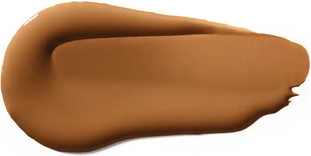 Textura cremosa e uniforme em tom de caramelo, com aparência suave e sedosa, típica de produtos de beleza da marca Vult.