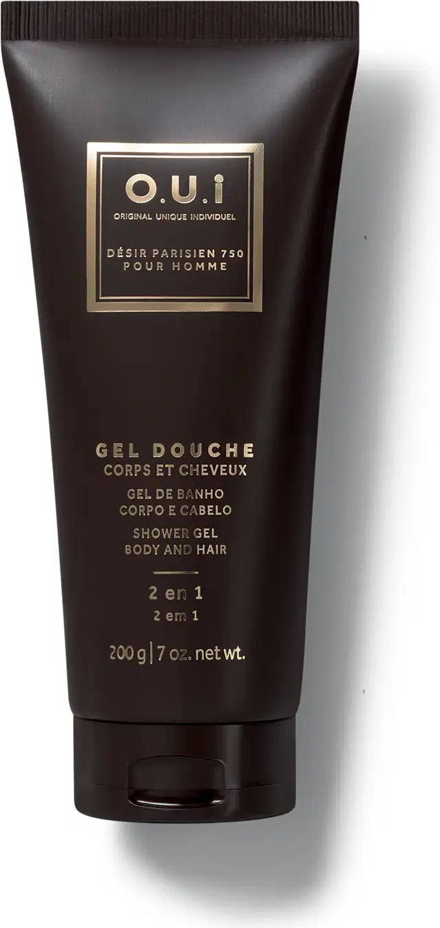 Frasco preto de gel de banho da marca O.U.i, com rótulo dourado em formato retangular contendo informações sobre o produto.