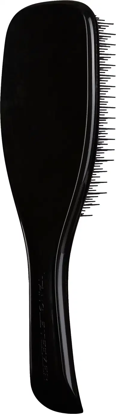 Escova de cabelo preta da marca Tangle Teezer, com design ergonômico e superfície ponteada para facilitar o desembaraço dos fios.