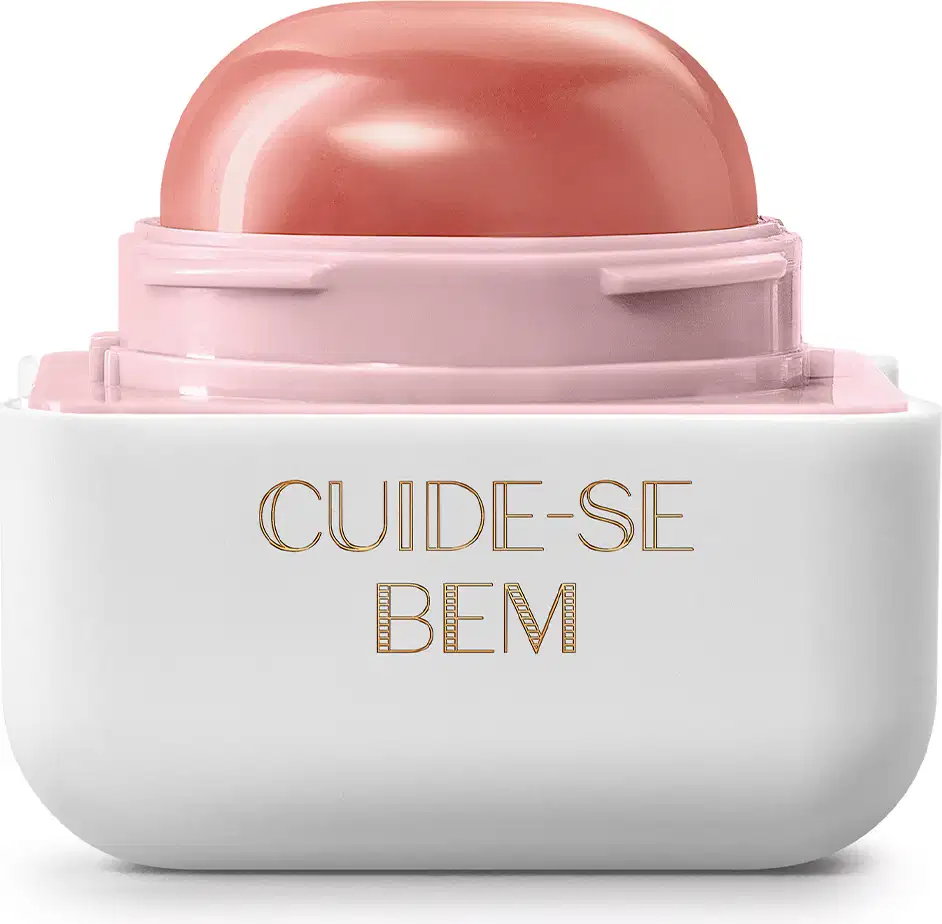 Pote compacto com cantos arredondados nas cores branca e rosa com roll-on rosa escuro contendo hidratante labial Intense & Cuide-se Bem Deleite.