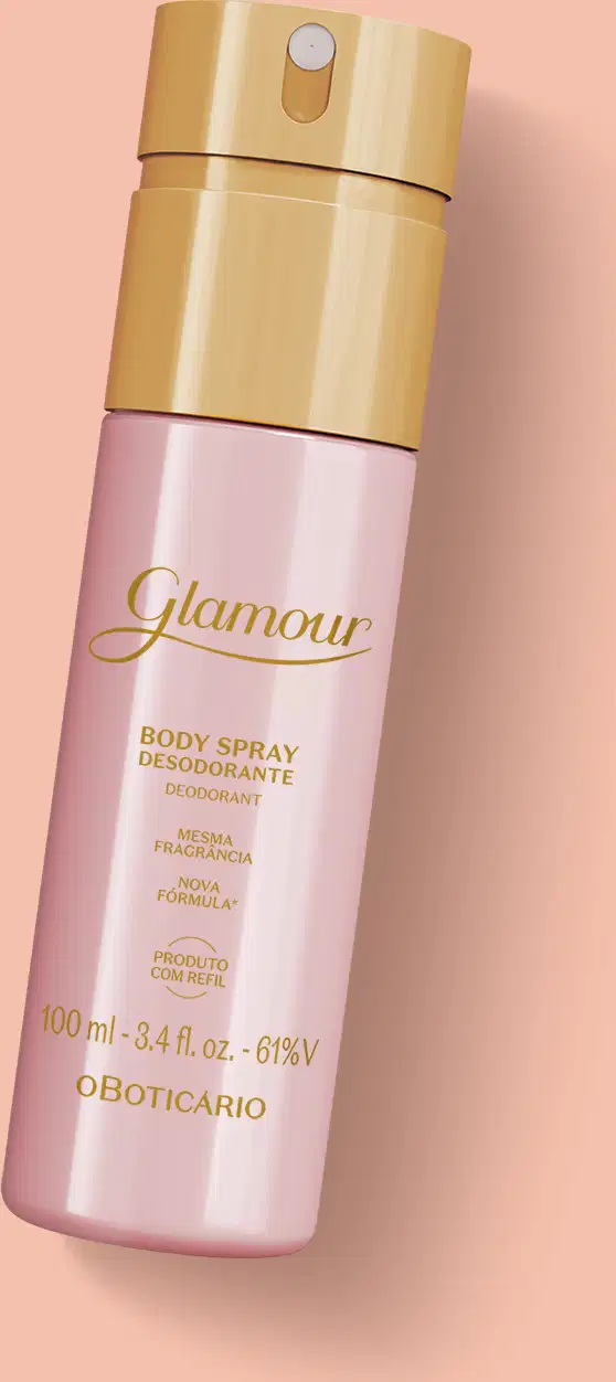 Frasco rosa com tampa e letras douradas contendo 100ml de body spray Glamour sobre fundo rosa.