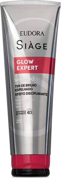 Frasco de shampoo Siàge Glow Expert, com embalagem de plástico transparente e rótulo vermelho e preto. O produto promete efeito disciplinante e brilho intenso nos cabelos.