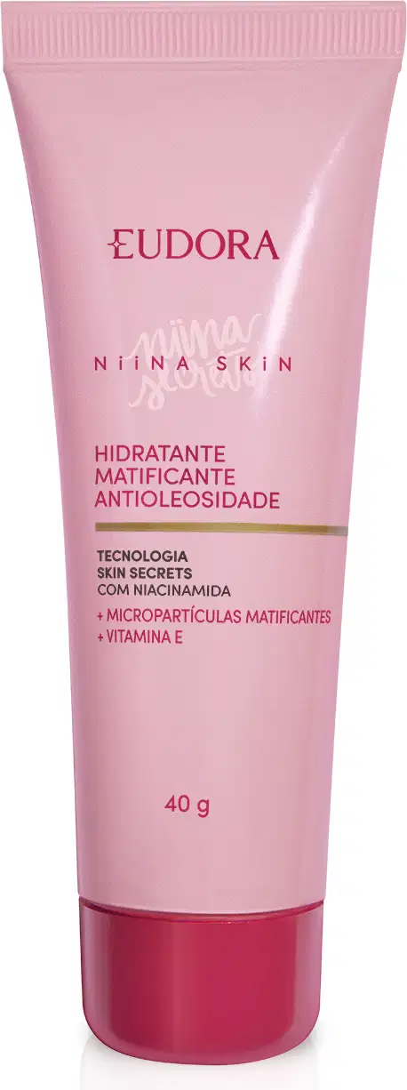Hidratante matificante antiquebra Niina Skin. O produto vem em uma bisnaga rosa com detalhes em um tom de vermelho mais escuro na base. As informações indicam que possui niacinamida, micropartículas matificantes e vitamina E. Peso de 40 gramas.