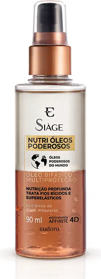 Frasco transparente com óleo alaranjado na parte inferior e transparente na parte superior. Rótulo com texto em preto e laranja. Tampa preta e detalhes em cobre.