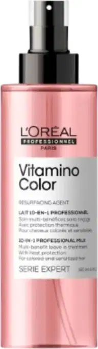 Frasco rosa com pulverizador preto da linha Vitamino Color da L'Oréal Professionnel, um produto de tratamento para cabelos coloridos.