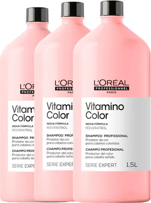 Três frascos de shampoo profissional L'Oréal Professionnel Vitamino Color, com rótulos em rosa e branco, apresentando a marca e a linha de produtos.