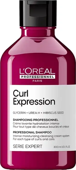 Frasco de shampoo L'Oréal Professionnel Curl Expression, com embalagem rosa vibrante e rótulo com informações sobre o produto, destinado a cabelos cacheados e ondulados.