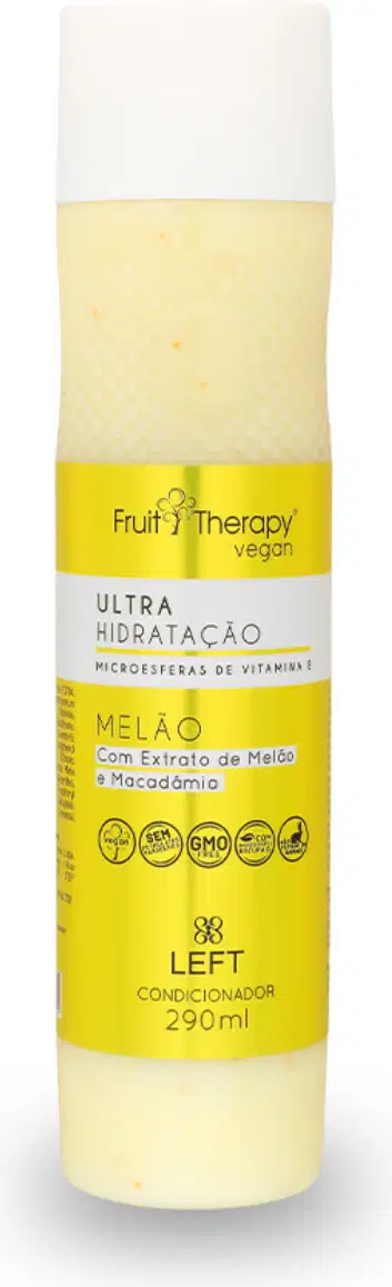 A imagem mostra um frasco amarelo e branco de condicionador da linha Fruit Therapy Vegan Melão. O frasco tem um design atraente, com cores vivas e informações detalhadas sobre benefícios, composição, além de certificações veganas e não testado em animais.