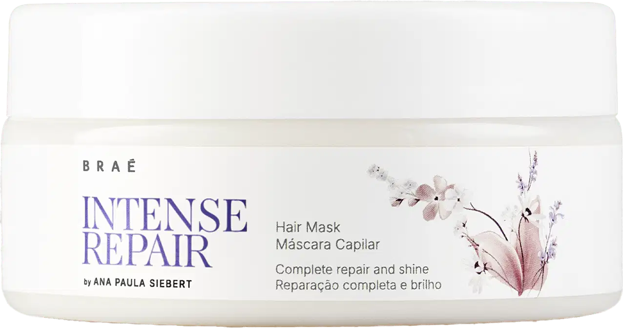 Embalagem branca com rótulo roxo e floral da linha Intense Repair da marca Braé, contendo máscara capilar para reparação e brilho completos dos cabelos.