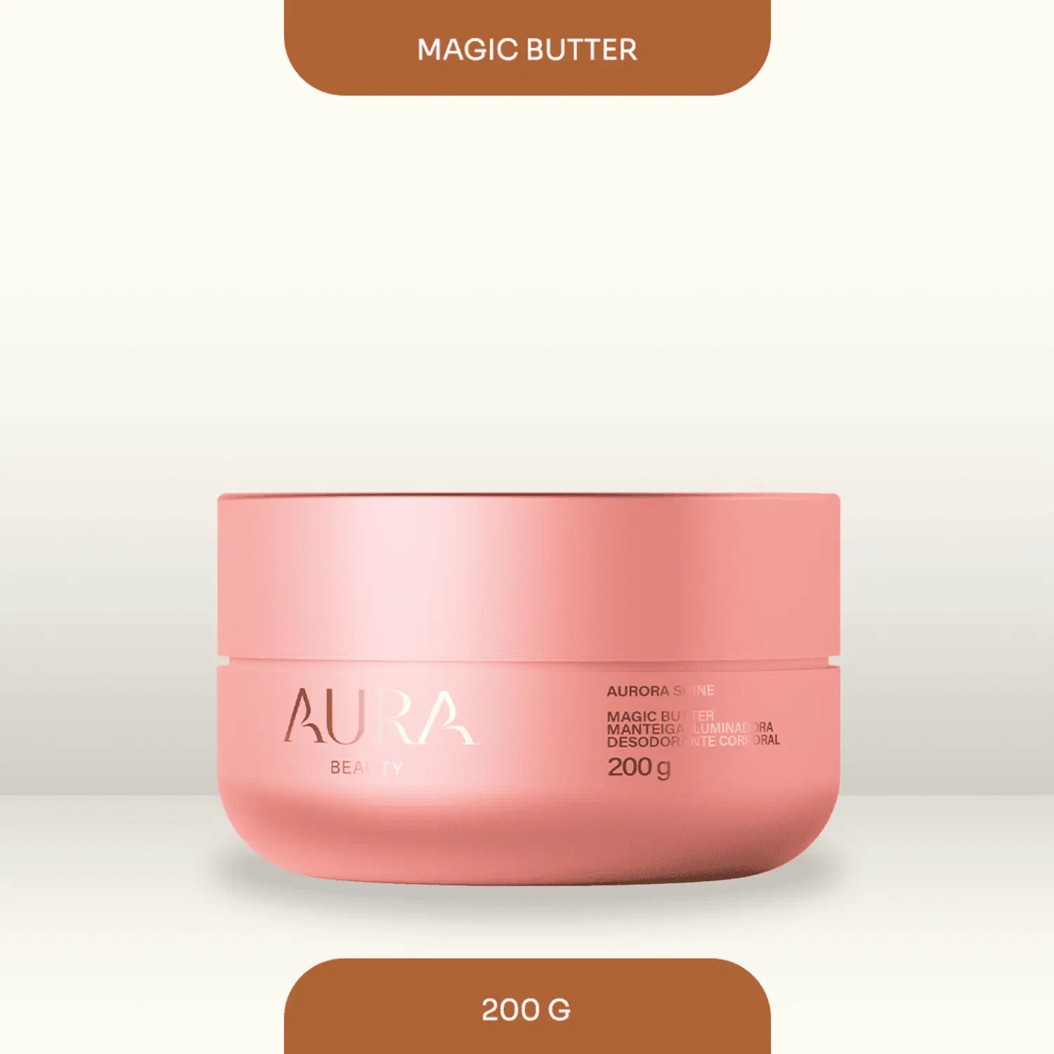 Pote rosa de 200g contendo "Magic Butter" da marca Aura Beauty, com rótulo destacando o nome do produto e informações sobre sua composição.