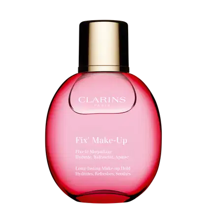 É uma embalagem redonda de vidro rosa vívido com um líquido vermelho brilhante dentro. A tampa é dourada metálica. No frente da embalagem, está escrito "Fix' Make-Up" e "Fixa o Maquillage Hidrata, Refresca, Acalma" em letras brancas.
